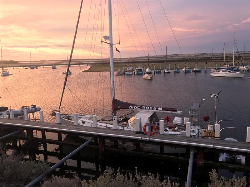 Sunset QCYC with Commodore Lee Renfree's boat PipeDream moored at wharf photo copyright Lee Renfree taken at Queenscliff Cruising Yacht Club and featuring the IRC class