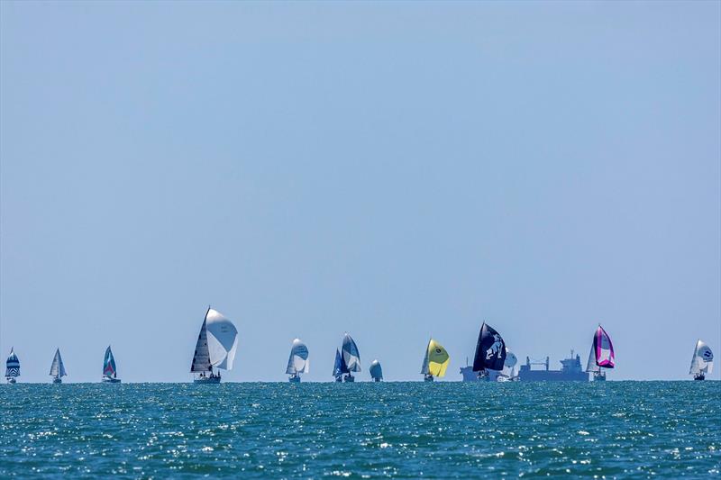 A bay of colour on a stunning SeaLink Magnetic Island Race Week Day 1 photo copyright Andrea Francolini / SMIRW taken at Townsville Yacht Club and featuring the IRC class