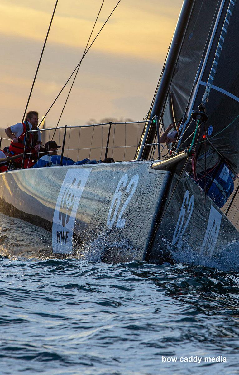 Whisper rolls over the swell in the Heads photo copyright Bow Caddy Media taken at Cruising Yacht Club of Australia and featuring the IRC class