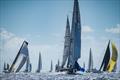 The 100+ boat fleet of the 44th St. Maarten Heineken Regatta converges on the leeward mark on the iconic Around the Island Race, traditionally hosted on Friday of the 4-day Regatta © Laurens Morel / www.saltycolours.com