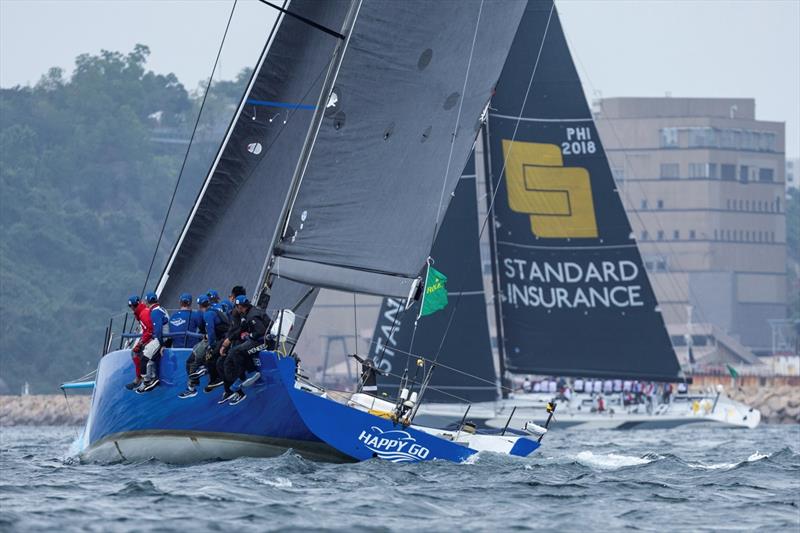 Standard Insurance Centennial V and Happy Go - 2024 Rolex China Sea Race - Day 3 photo copyright Rolex / Andrea Francolini taken at Royal Hong Kong Yacht Club and featuring the IRC class
