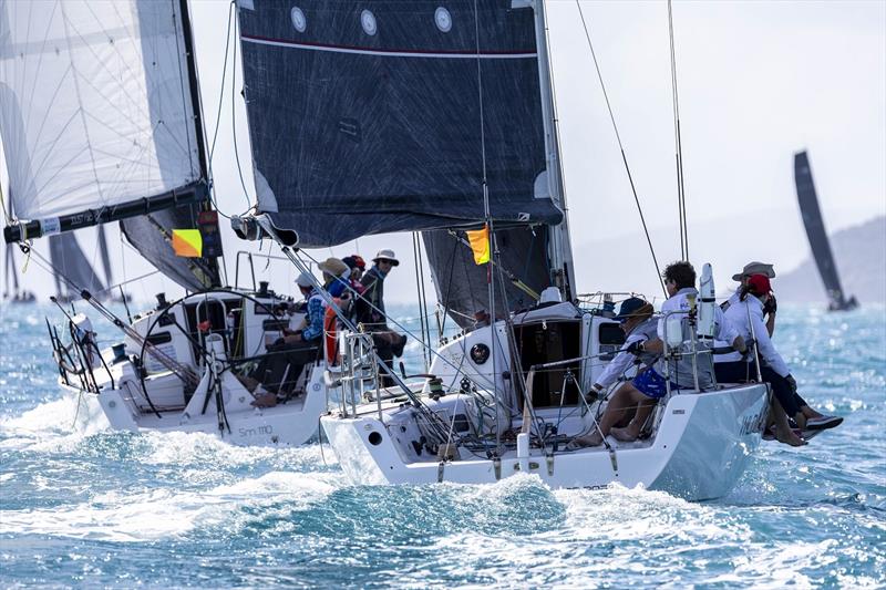 Joust and Wild Card neck and neck - 2024 Ocean Dynamics and Mount Gay Airlie Beach Race Week photo copyright Andrea Francolini / ABRW taken at Whitsunday Sailing Club and featuring the IRC class