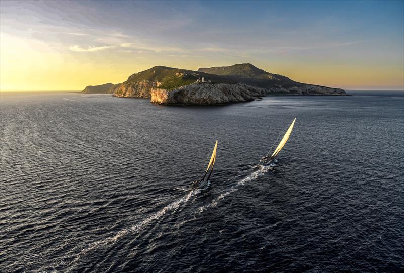 Furiosa and Kalima in close company at sunrise on the approach to the Island of Levanzo photo copyright Kurt Arrigo / Rolex taken at Royal Malta Yacht Club and featuring the IRC class