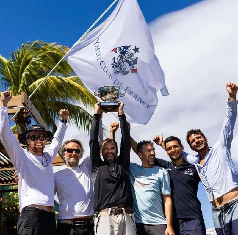 Cocody lifts the Yacht Club de France Trophy - photo © Arthur Daniel / RORC