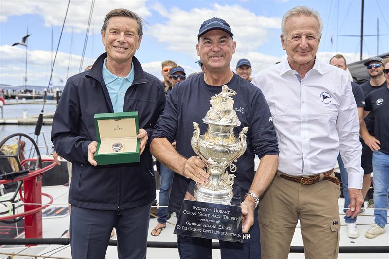Laurent Delanney, Rolex Associate Director Global Sponsorship & Partnership presenting Sam Haynes with the Rolex Timepiece and Vice-Commodore of the CYCA David Jacobs - photo © Rolex | Carlo Borlenghi