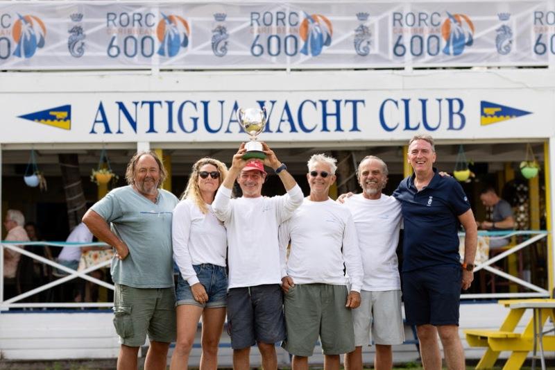 Multihull Line Honours for Marc Guillemot & crew on MG5 Wellness Training Multihull, with RORC CEO Jeremy Wilton - photo © Arthur Daniel / RORC