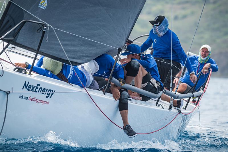 45th St. Maarten Heineken Regatta Day 1: Teams became becalmed by Creole Rock and had to use expert weight placement to make up every bit of boat speed photo copyright Laurens Morel / www.saltycolours.com taken at Sint Maarten Yacht Club and featuring the IRC class