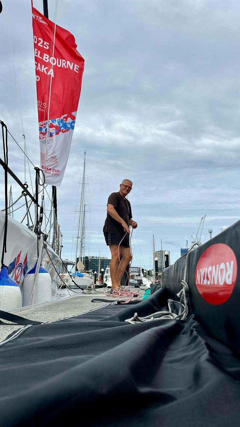 Setting up the boom again with new lines - Melbourne Osaka Race - photo © Darrell Greig