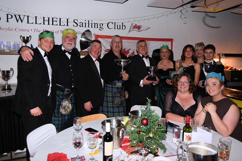 Team Finally receiving trophies - Pwllheli SC Christmas Prize-giving photo copyright Gerallt Williams taken at Pwllheli Sailing Club and featuring the IRC class