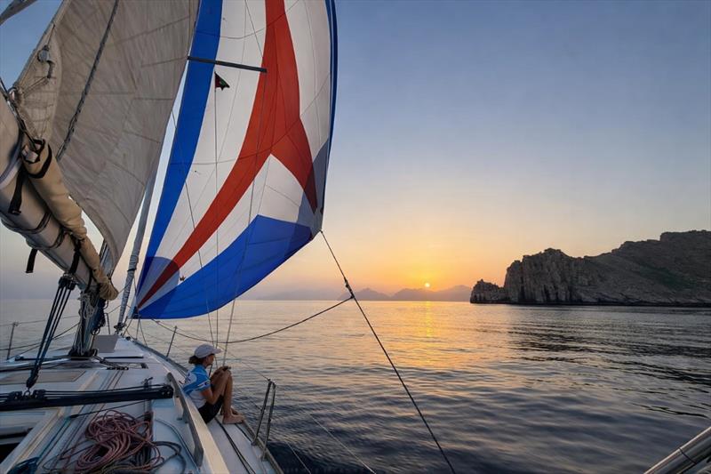 Majed Aki's Astartia sailing around the Strait of Hormuz in light breeze - 2026 Aramex Dubai to Muscat Offshore Sailing Race photo copyright Mikey Brignall / DOSC taken at Dubai Offshore Sailing Club and featuring the IRC class
