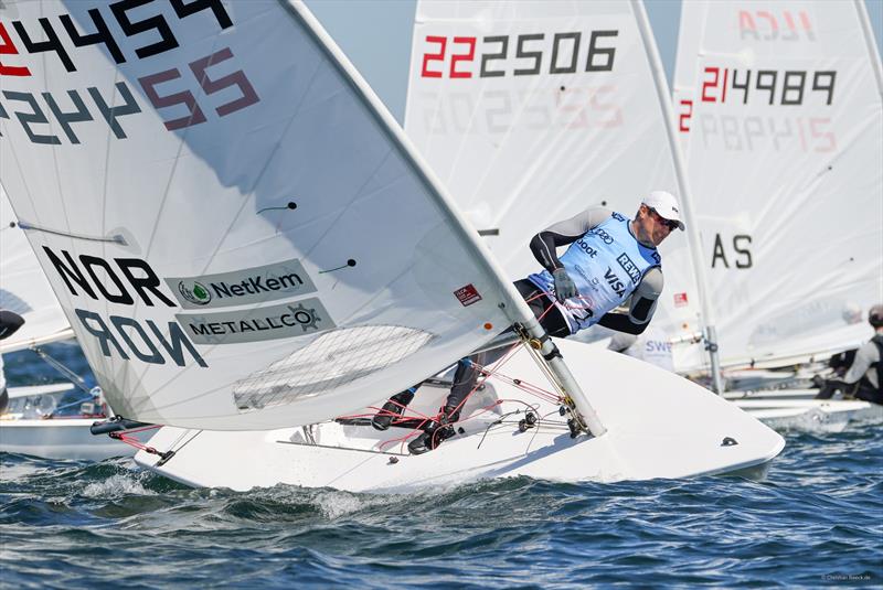 Hermann Tomasgaard roll-tacks his way out of an ILCA 7 start line photo copyright Christian Beeck taken at Kieler Yacht Club and featuring the ILCA 7 class
