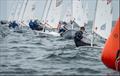 ILCA 4 close racing to the top mark © Beau Outteridge