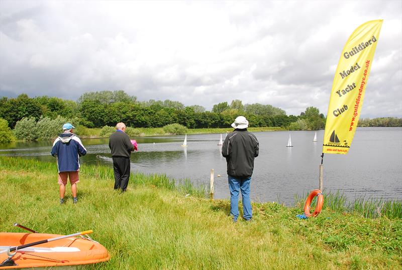 GAMES 6 Nylet RM Challenge Trophy: the scene at Abbey Meads with the strong gusty streaks contrasting with calm waters photo copyright Roger Stollery taken at Guildford Model Yacht Club and featuring the Marblehead class