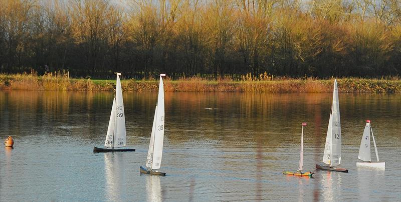 Brass Monkey Christmas race at Abbey Meads - the leading boats in both fleets, Phil Holliday 12, Stollery's 39 & 139 with Mike Wilkie 995 neck and neck with Roger 2. (our total scores also tied!) - photo © Roger Stollery