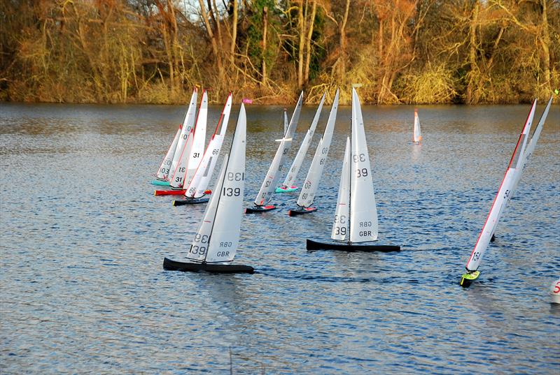 Brass Monkey Christmas race at Abbey Meads - Oliver 139 made a perfect port tack start crossing all the starboard tack boats (the importance of being at the front of the grid comes from his go-karting!) photo copyright Roger Stollery taken at Guildford Model Yacht Club and featuring the Marblehead class