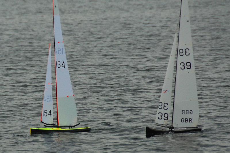Another close encounter, Nigel Barrow and Peter Stollery - Marblehead GAMES 7 at Littleton with Guildford MYC - photo © Roger Stollery