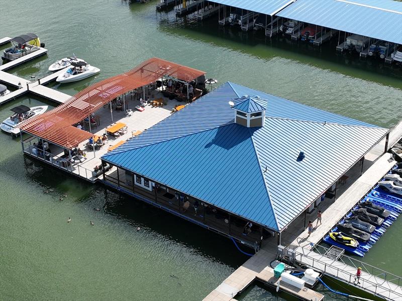 Marine Development Inc. designed, manufactured and installed a new floating patio, fuel dock and courtesy dock with slips for Clinton Lake Marina photo copyright Marine Development Inc. taken at  and featuring the Marine Industry class