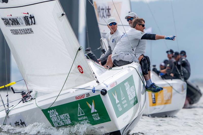 Williams leads Egnot-Johnson into the weather mark. Left - Williams (GBR) Pindar by Manuport Logistics with crew Jon Gundersen, Richard Sydenham, and Gerry Mitchell. Right - Egnot-Johnson (NZL) KNOTS Racing with crew Jack Frewin, Zak Merton, & Chris Main - photo © Ian Roman / WMRT