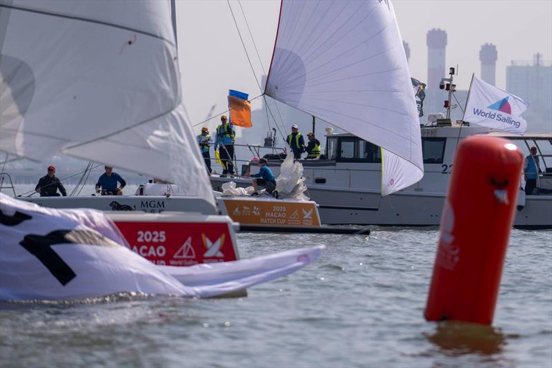 USA's Gavin Brady/ True Blue Racing crosses the line seconds ahead of USA's Chris Poole/ Riptide Racing - 2025 Macao Match Cup day 2 - photo © Ian Roman / WMRT