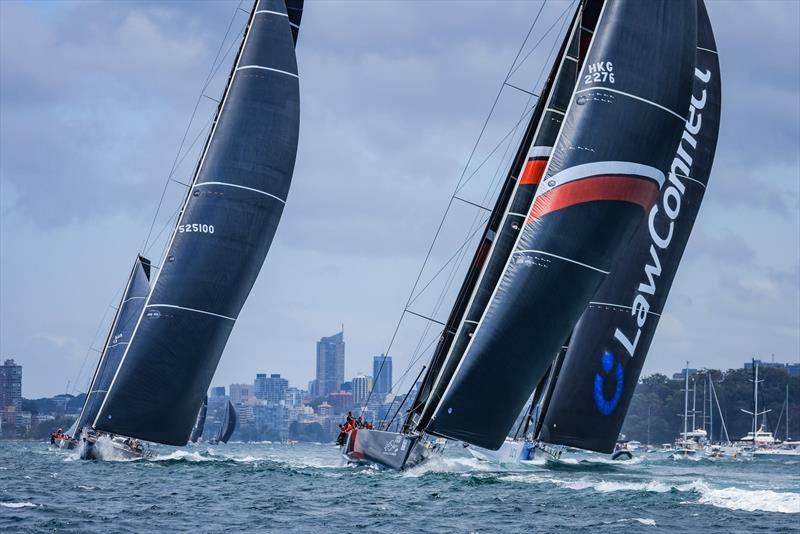 Supermaxis exit Sydney Harbour -  2021 Rolex Sydney Hobart Yacht Race photo copyright Salty Dingo taken at Cruising Yacht Club of Australia and featuring the Maxi class