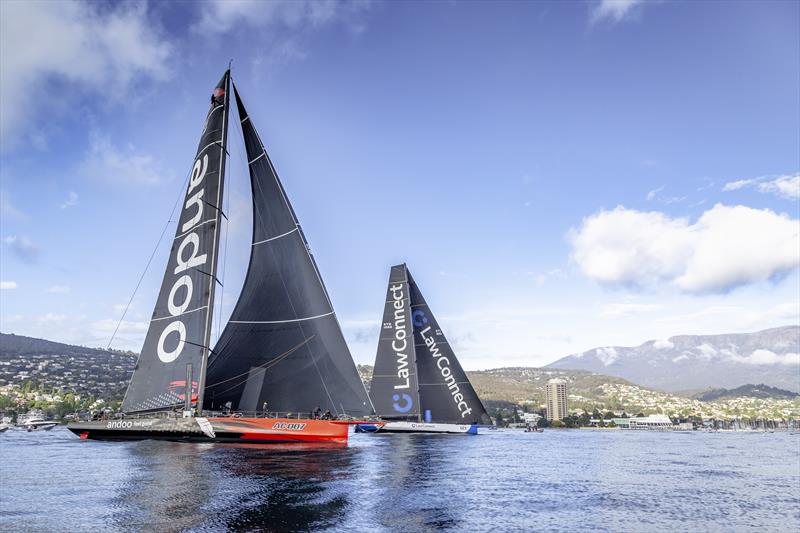 andoo Comanche and LawConnect battle to the Rolex Sydney Hobart Yacht Race finish photo copyright Rolex / Kurt Arrigo taken at Cruising Yacht Club of Australia and featuring the Maxi class