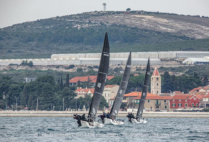 Close racing against the scenic backdrop of Biograd - Luki Baustoffe CRO Melges 24 Cup 2025 Biograd photo copyright Hrvoje Duvancic / regate.com.hr taken at  and featuring the Melges 24 class