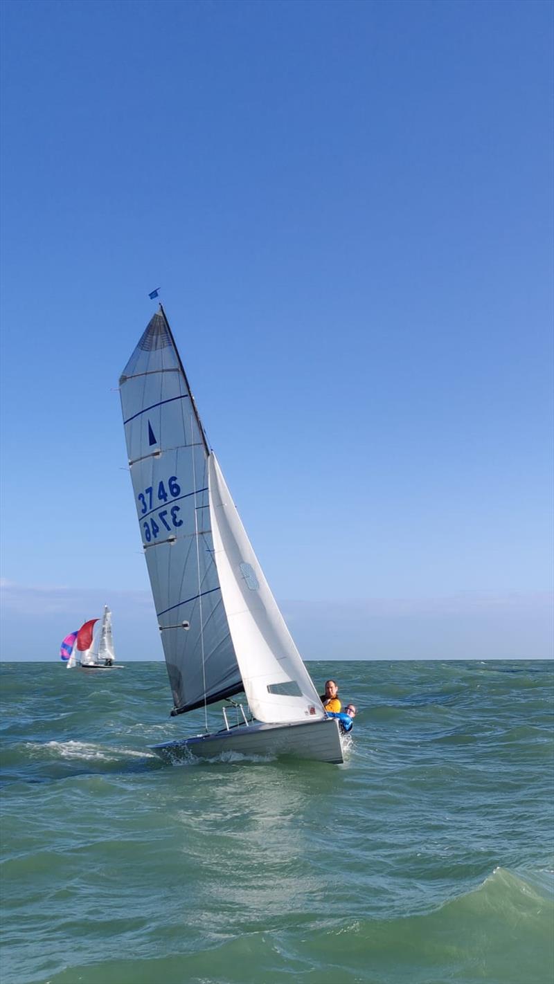 James Wells and Anna Aylward spot the camera during the 2024 Merlin Rocket Allen SE Circuit at Shoreham photo copyright David Larner, Louise Carr, Roland Whitehead taken at Shoreham Sailing Club and featuring the Merlin Rocket class