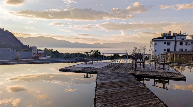 View over the lake on Saturday evening at 2025 Lake Fuxian Regatta - photo © Mark Jardine