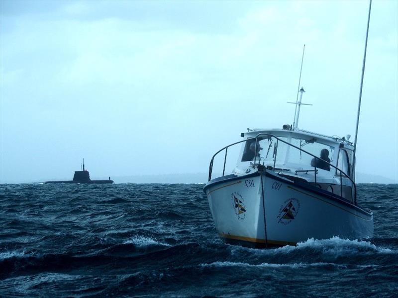 Submarine with SSCBC start boat Volunteer - 2020 RS:X Windsurfing World Championships, day 2 - photo © Caitlin Baxter