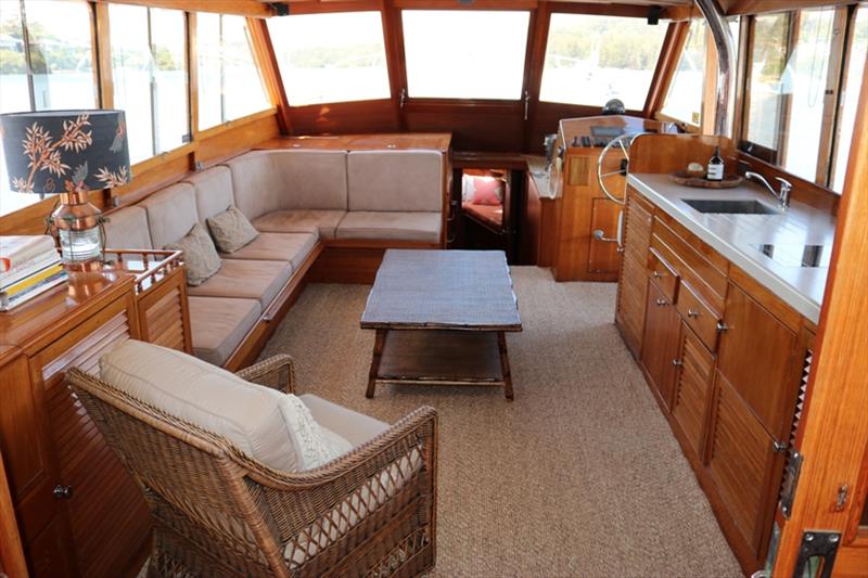 Classic entertaining lounge with ample seating and room to relax and enjoy grandeur of Palmyra. All galley facilities incorporated within interior behind beautifully crafted tradtional french polished timber panelling to retain wonderful heritage appeal photo copyright Power Equipment Pty Ltd taken at 