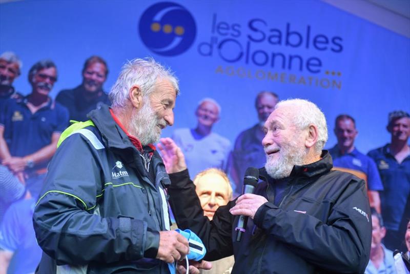 Jean-Luc Van Den Heede (left) being congratulated by Sir Robin Knox-Johnston after winning the 2018/19 Golden Globe Race photo copyright Christophe Favreau / PPL / GGR taken at 