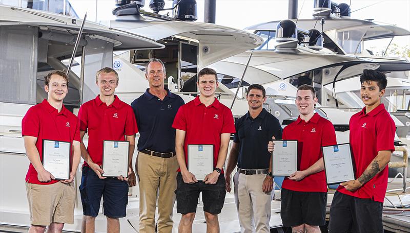 Riviera safety and training manager Adam Houlahan (left) and Riviera owner Rodney Longhurst (right) congratulate apprentices recently recognised for excellence in their craft, (from left) Baily Sivyer, Albert Michell and Lauren Abbott - photo © Richard Gosling