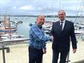 John O’Donnell of International Paint shakes hand with Andrew Pearce, Poole Regatta President © Poole Regatta Committee