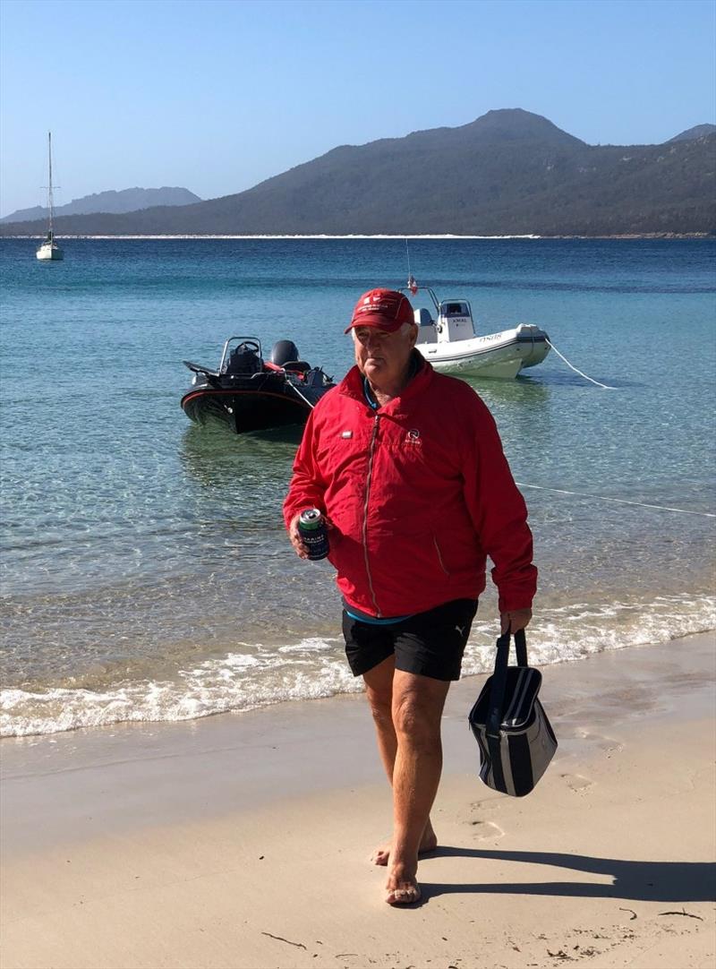 Captain Ray heading for drinks on the beach to shoot the breeze photo copyright Riviera Australia taken at 