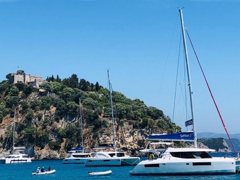 Our fleet anchored off Parga on Mainland photo copyright Offshore Sailing School taken at 