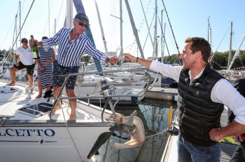Berth holder gives Sir Ben Ainslie champagne photo copyright Buckler’s Hard Yacht Harbour taken at 