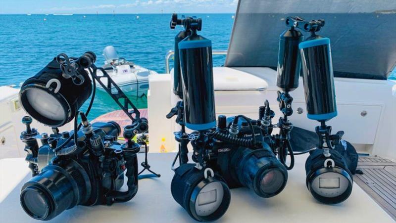 The underwater camera rigs ready for adventure, and within easy reach are the scuba tanks located in the cockpit storage lockers. - photo © Riviera Australia