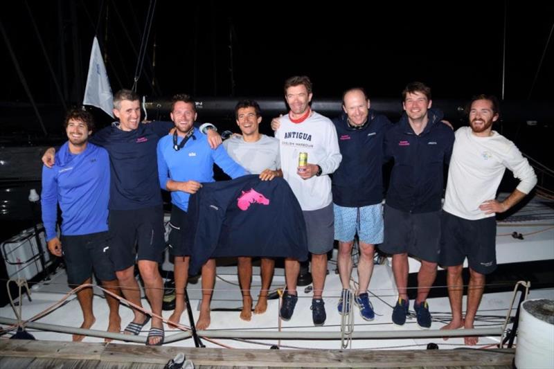 The crew of Dawn Treader enjoyed a cold Carib beer and warm welcome after their close finish photo copyright Tim Wright / photoaction.com taken at Royal Ocean Racing Club