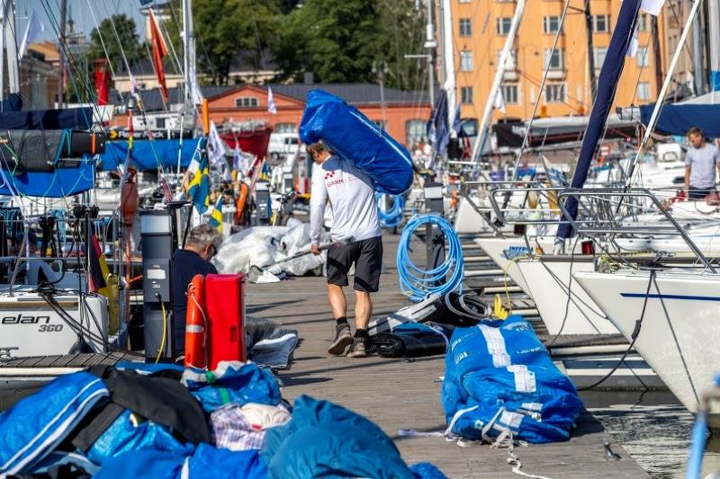 The docks at MarinaBay are buzzing with activity ahead of the start photo copyright Pepe Korteniemi / www.photex.fi taken at Royal Ocean Racing Club