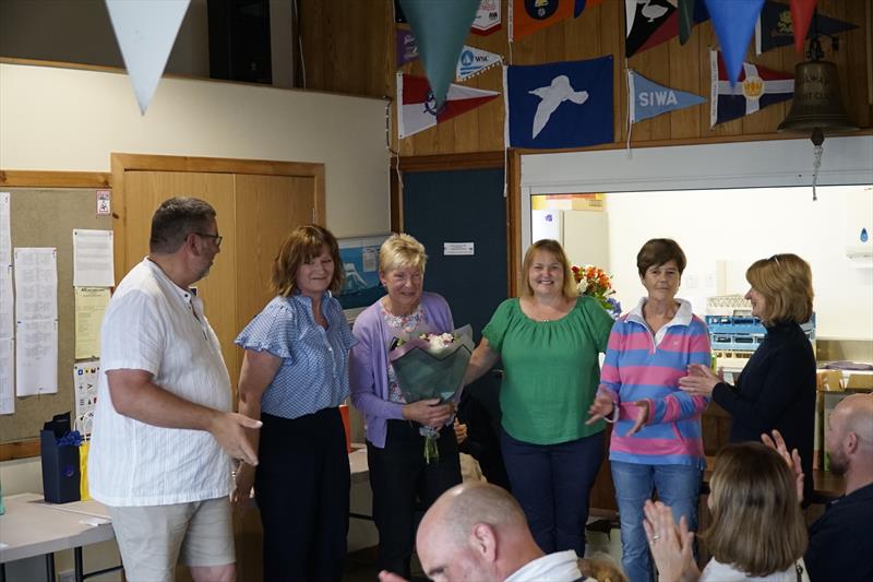 Kippford Week Galley Girls! Scott McColm presents Club Social Secretary Liz Train with a boquet with the ladies who did much for the social events, Fiona, Liz, Brydie, Lindsey and Linda photo copyright Finlay Train taken at Solway Yacht Club