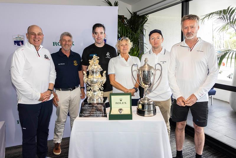 The panelists standing around the Overall winner trophy, Rolex timepiece and Line Honours trophy (left to right). Panelists from left to right: Matt Allen, Peter Bremner, Sebastian Bohm, Wendy Tuck, Phillip Kurts and Christian Beck  photo copyright CYCA  | Andrea Francolini taken at Cruising Yacht Club of Australia