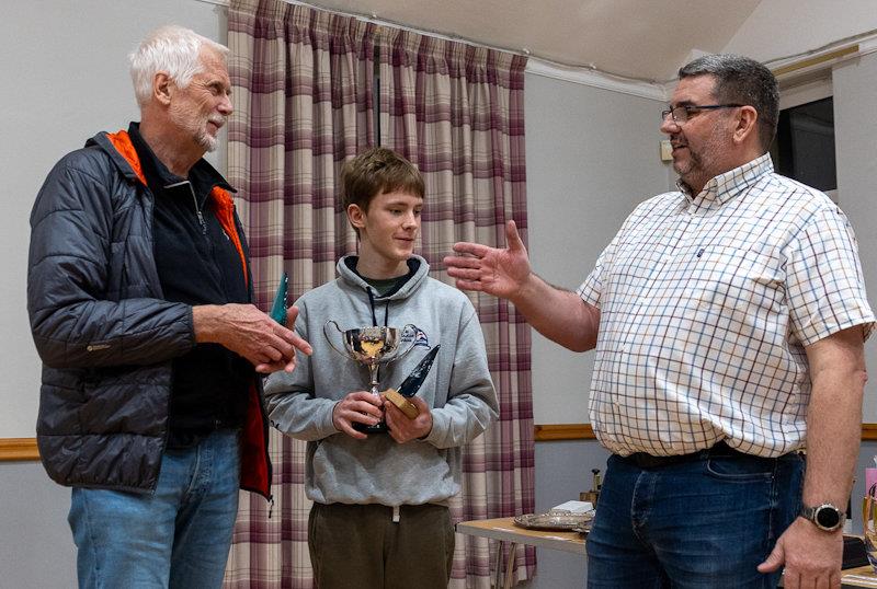 Solway YC Club Champions; joint winners Keith Veasey (left) and Club and Cadet Winner Toby Iglehart, congratulated by Scott McColm, Club Commodore photo copyright Nicola McColm taken at Solway Yacht Club