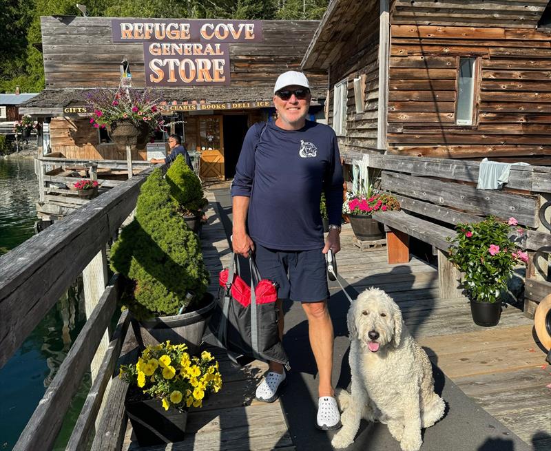 Mark outside Refuge Cove general store, the only shop for more than 70 kilometres - photo © Riviera Australia