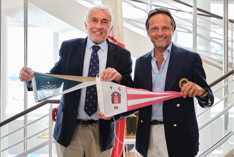 Mr Bernard d'Alessandri, General Secretary of Yacht Club de Monaco, and Mr John Pagano, Group CEO of Red Sea Global, the developer of AMAALA, formally exchanged burgees during the Monaco Yacht Show photo copyright AYC taken at AMAALA Yacht Club