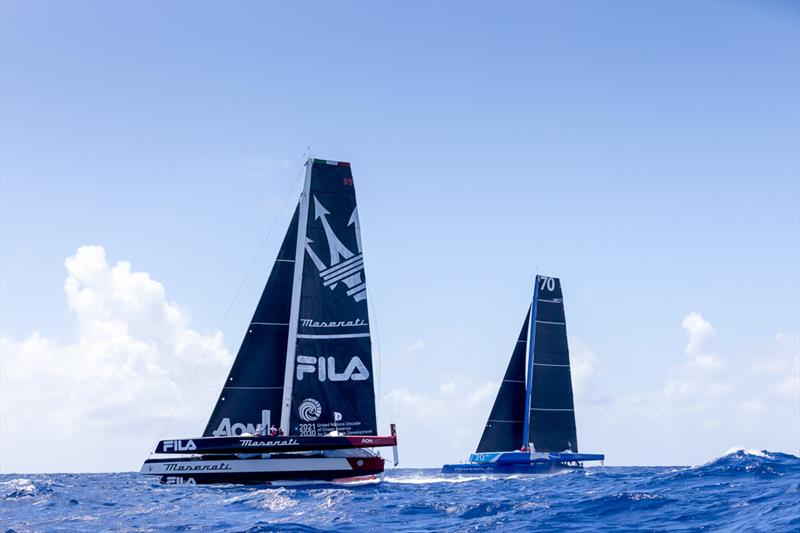 Giovanni Soldini's Multi70 Maserati (ITA) and Peter Cunningham's MOD70 PowerPlay (CAY) start the 13th RORC Caribbean 600 photo copyright Arthur Daniel / RORC taken at Antigua Yacht Club and featuring the MOD70 class