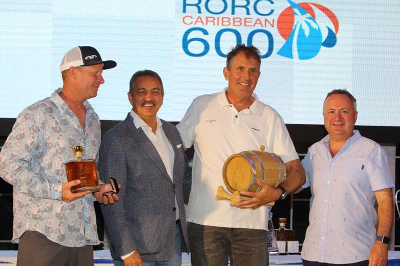 RORC Caribbean 600 - Hon. Charles 'Max' Fernandez presents Pete Cummins and Brian Thompson from Jason Carroll's MOD70 Argo with the Multihull Line Honours trophy photo copyright Tim Wright / www.photoaction.com taken at Royal Ocean Racing Club and featuring the MOD70 class