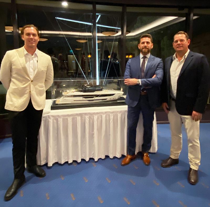 The Yacht Sales Co. sales executives Sam Stevenson (left) and Marcus Overman (right) celebrate the dealership appointment with Gulf Craft International Sales Manager Marios Christopoulos - photo © The Yacht Sales Co.