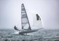 Graeme Oliver – Sailing through fog at the 2024 Musto Skiff Open © Michael Oliver