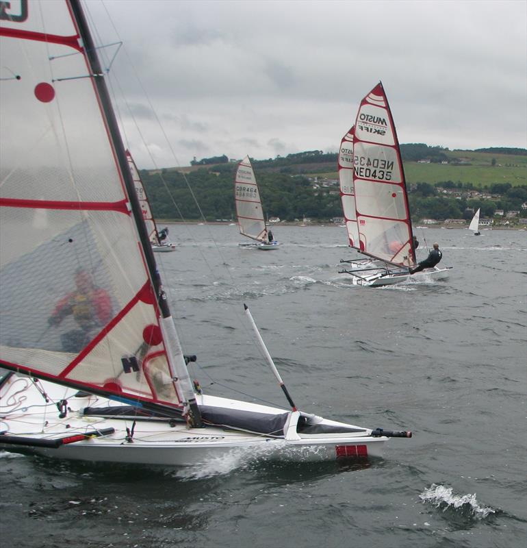 Tight starting on a challenging line Saturday at Chanonry photo copyright Kevin Holliday taken at Chanonry Sailing Club and featuring the Musto Skiff class