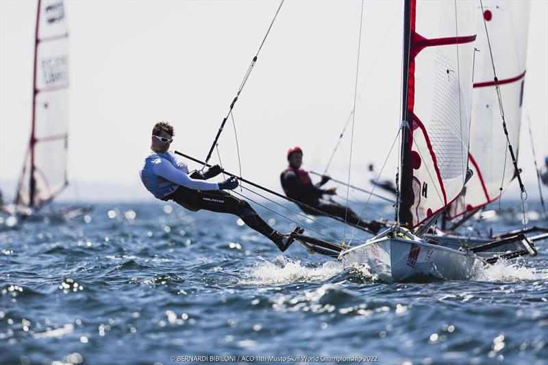 Dan Vincent during the ACO 11th Musto Skiff World Championship 2022 photo copyright Bernardí Bibiloni / www.bernardibibiloni.com taken at Kieler Yacht Club and featuring the Musto Skiff class